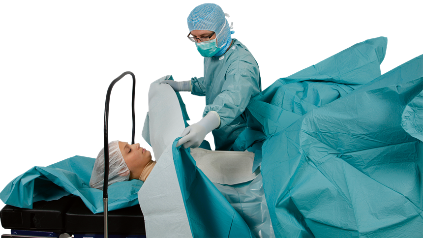 Operatielaken uitgevouwen op een patiënt